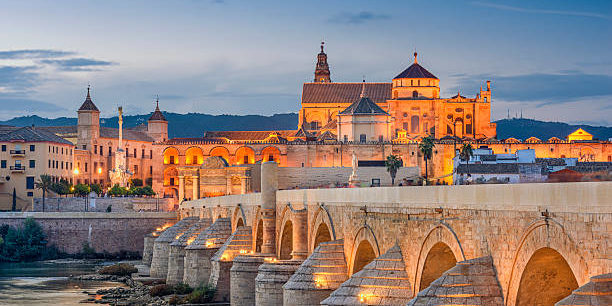 Cordoba, Spain view of the Roman Bridge and Mosque-Cathedral on the Guadalquivir River.